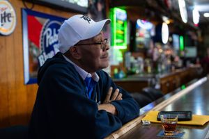 Jerome Davis has a drink at the Buchanan Street Pub in Belvidere, Ill., on March 11, 2023. Davis was laid off from his job at the idled Jeep factory in Belvidere. Photo for The Washington Post by Kayla Wolf