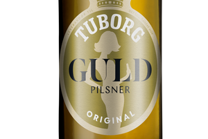 Carlsberg opdaterer den gyldne dame på Guld Tuborg og udskifter bakken med en øl, så hun »er med til festen«. 