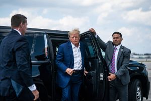 Former president Donald Trump boards his plane at Palm Beach International Airport in West Palm Beach, Fla., on March 13. Washington Post photo by Jabin Botsford