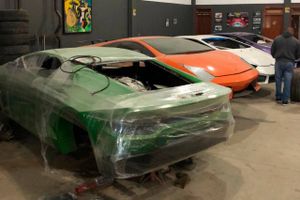 This July 15, 2019 photo released by Itajai Civil Police, shows car molds of luxury car replicas at a workshop in Itajai, Brazil. Brazilian police dismantled a clandestine workshop run by a father and son who assembled fake Ferraris and Lamborghinis to order, in Brazil's southern state of Santa Catarina. (Itajai Civil Police via AP)