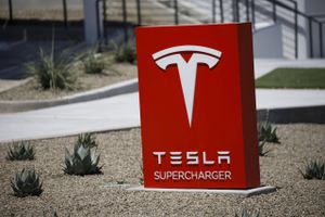 Signage outside the Tesla Inc. Supercharger station in Kettleman City, Calif., on July 31, 2019. MUST CREDIT: Bloomberg photo by Patrick T. Fallon.