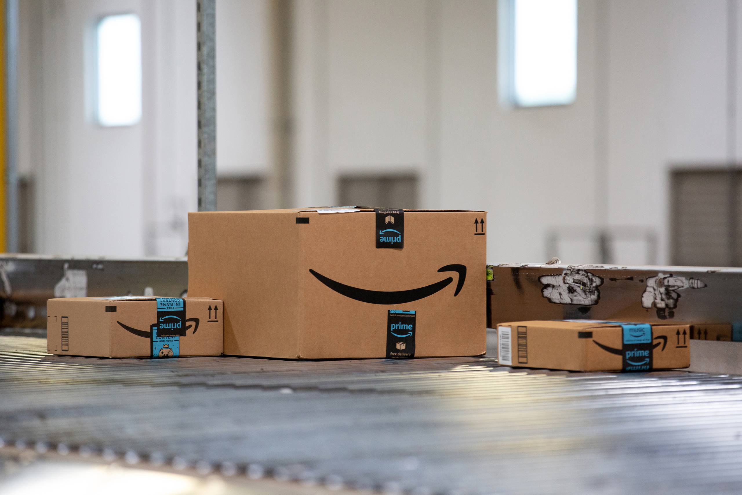 Packages move along a conveyor belt at the Amazon.com Inc. fulfillment center in Robbinsville, New Jersey on June 7. MUST CREDIT: Bloomberg photo by Bess Adler.