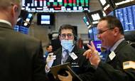 Aktiehandlere er i gang med fredagens handel på New York Stock Exchange den 20. marts 2020. Foto: Lucas Jackson/Reuters