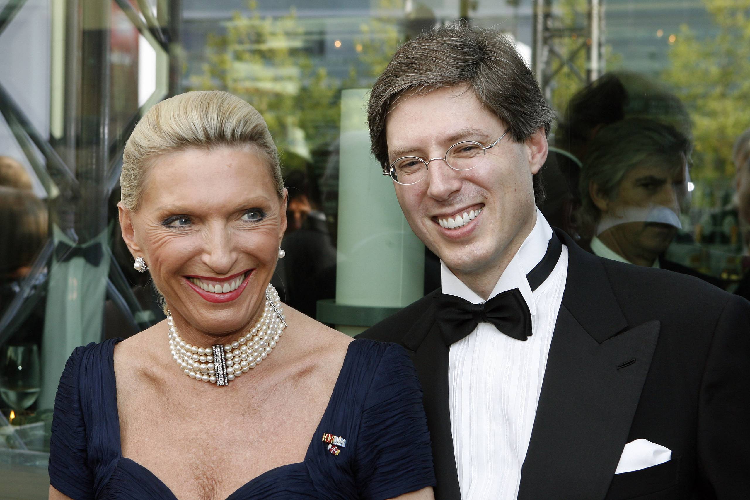(AP Photo/Daniel Karmann, pool) ---Proprietors Maria-Elisabeth Schaeffler, left, and her son Georg F.W. Schaeffler of Ina Holding Schaeffler KG talk during the celebrations marking the 100th anniversary of German carmaker Audi, Thursday July 16, 2009 in Ingolstadt, southern Germany. (AP Photo/Daniel Karmann, pool)