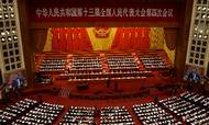 Folkets Store Sal i Beijing. Kinas præsident, Xi Jinping, har gjort nedbringelsen af økonomisk ulighed til partiets næste, store projekt. For Kina er mere ulige end mange andre lande – men har stadig en imponerende middelklasse. Foto: AP Photo/Andy Wong/Ritzau Scanpix
