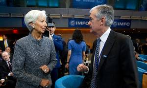 Christine Lagarde, formand for ECB, og Jerome Powell, chef for Federal Reserve, har de seneste måneder taget del i en verdensomspændende pengepolitisk stramning. Foto: AP/Jose Luis Magana