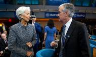 Christine Lagarde og Jerome Powell skal i den kommende uge afgøre, om de skal skrue kraftigt ned for seddelpressen. Foto: AP/Jose Luis Magana
