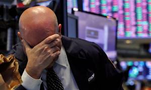 De finansielle markeder sitrer af nervøsitet. Det giver heftige udsalg - bl.a. af danske realkreditobligationer. Foto: AP/Richard Drew
