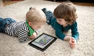 Børnehavebørn er så glade for at spille og se film på tablets, at to ud af tre svarer, at de hellere vil »spille iPad end lege med andre børn« i en ny undersøgelse fra Børnerådet.  Jan Haas/AP Images