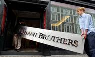 Lehman Brothers var en spand benzin på finanskrisens ulmende bål. Men hvor den næste krise kommer til at gøre ondt i Danmark, er der ikke enighed om. Foto: AP Photo/Kirsty Wigglesworth