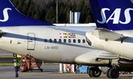 Et af SAS' Boeing 737 fly. SAS har besluttet at fortsætte med at bruge flytypen efter et andet Boeing-fly styrtede ned i Kina mandag. Foto: AP Photo/Johan Nilsson
