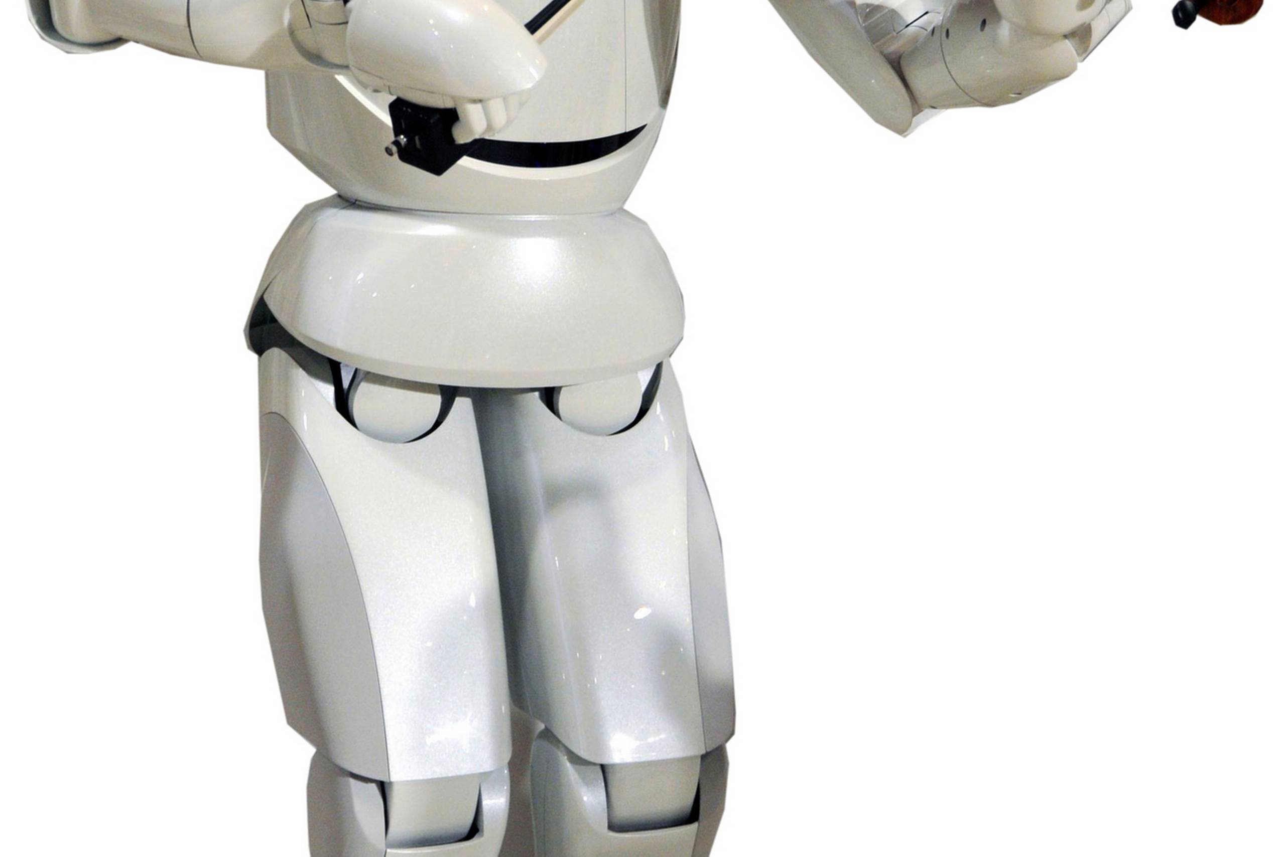 Toyota Motor Corp.'s robot spillede violin under en pressekonference den 6. december 2007. Foto: Katsumi Kasahara/AP