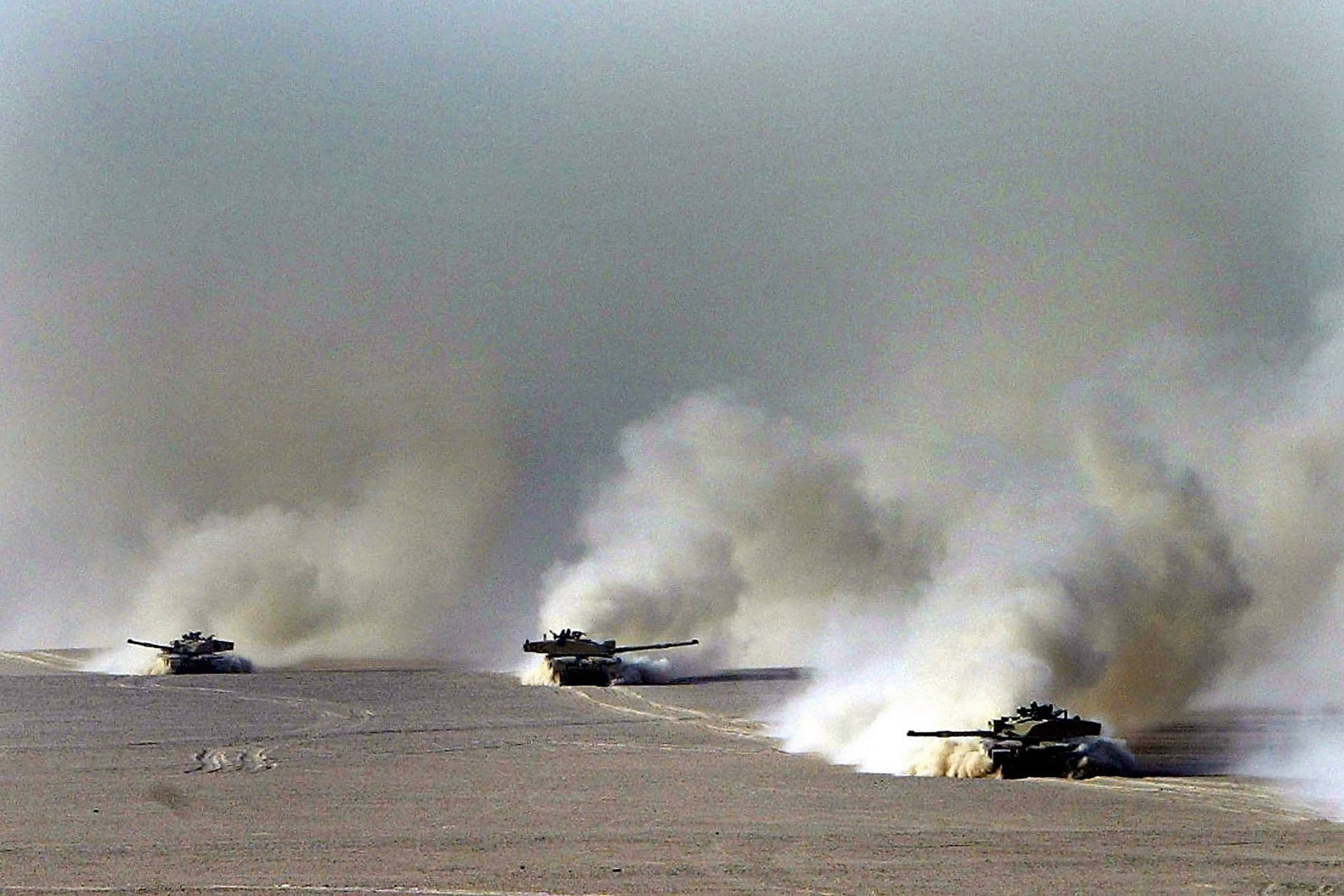 Sådan ser krige ud, mener de fleste, men glem det. I fremtiden bliver krige udkæmpet på helt andre måder, mener eksperter. Foto: AP/Dan Chung