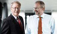 Jan Tøpholm (tv.) og Anders Westermann, hvis familier har skabt sin milliardformue på virksomheden Widex. Nu er Widex-familierne begyndt at investere i såkaldte CLO'er. Foto: Widex (Collage: Finans)